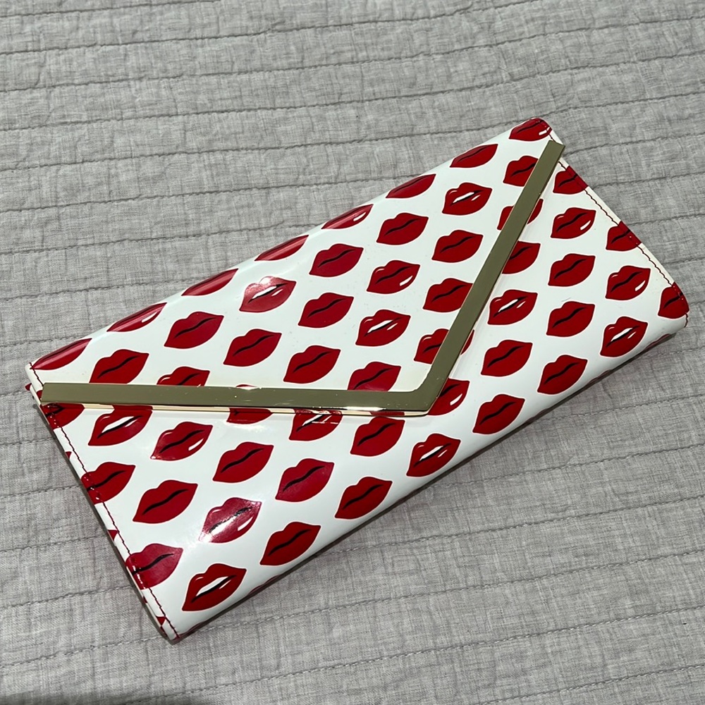 ALDO Red Lips Clutch with gold chain. Brand new, never used.